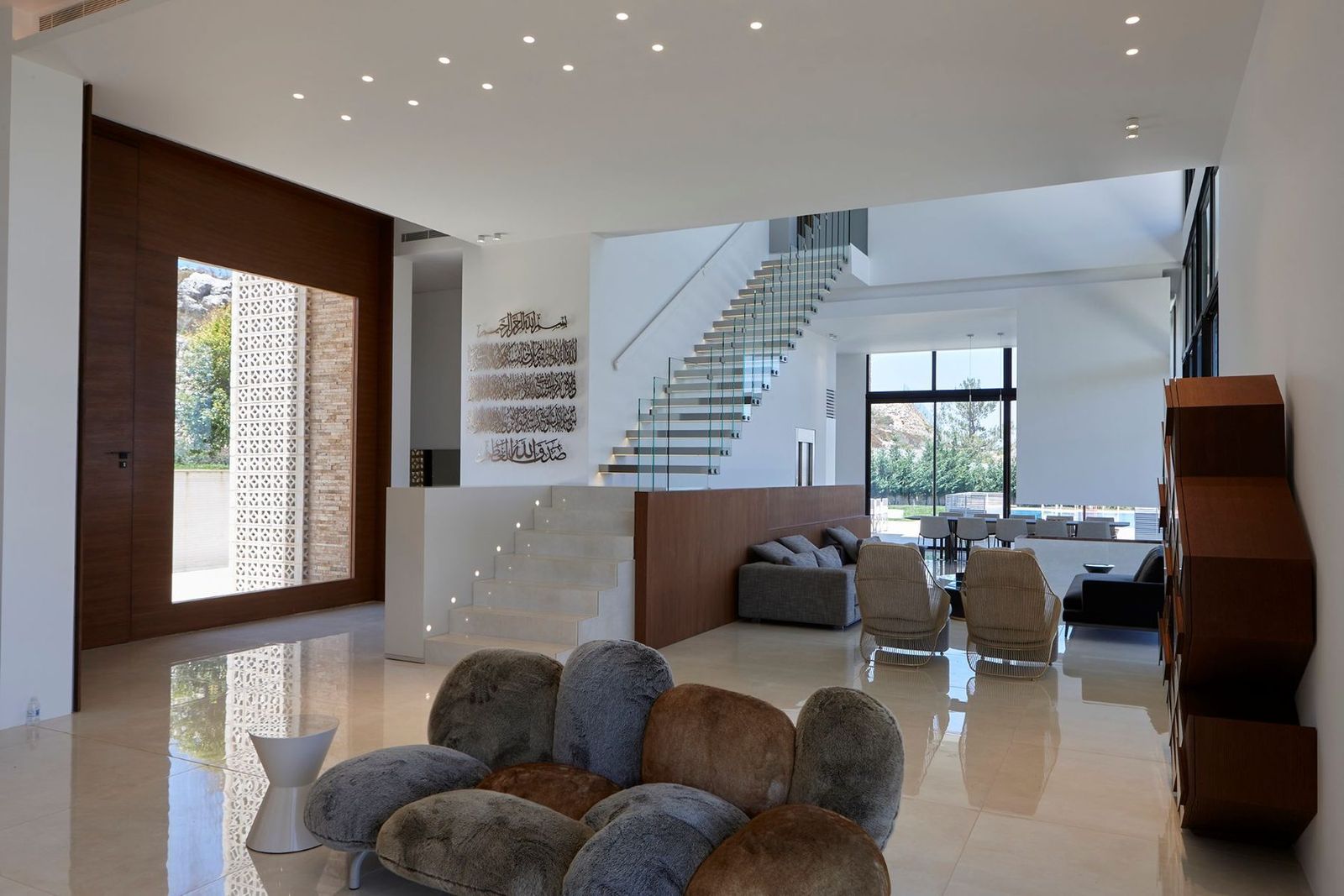 entry hall — the floating stair and lattice window